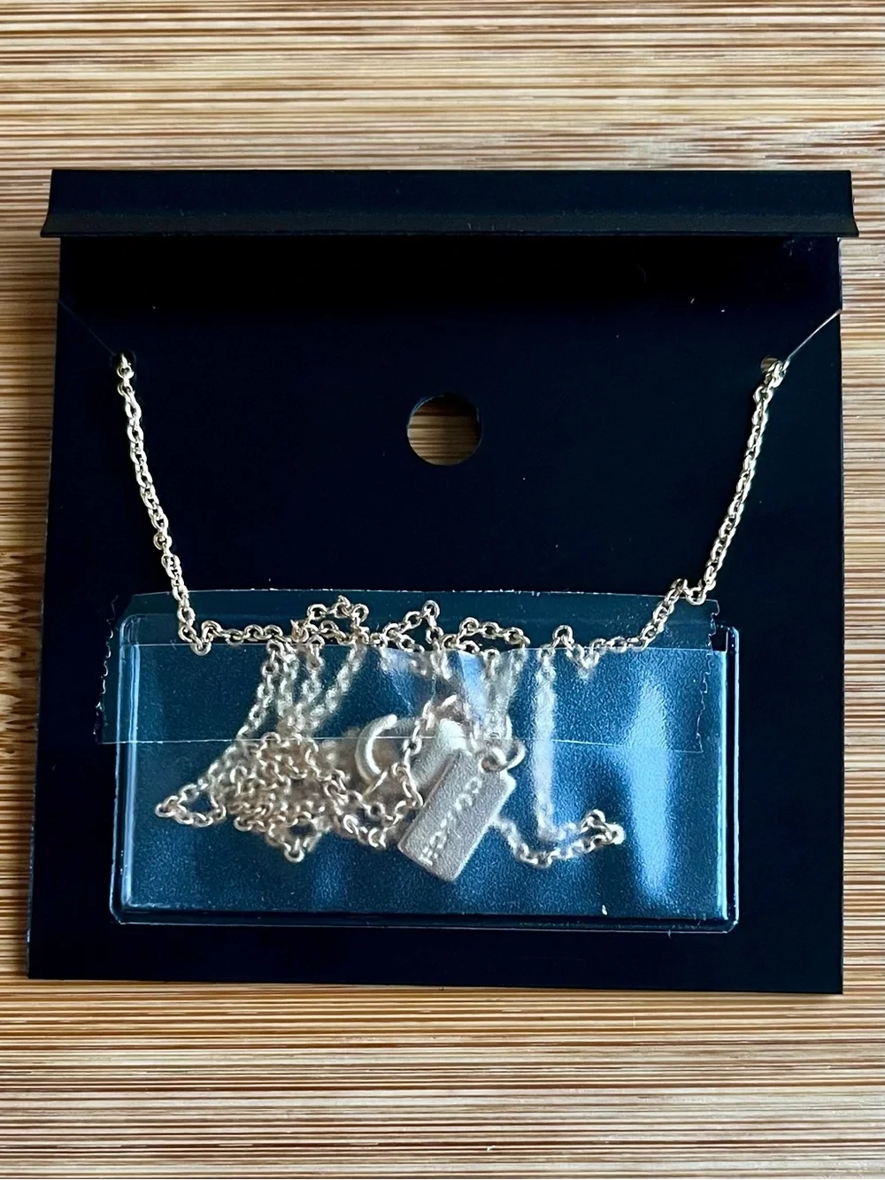 Coach Signature Butterfly Necklace Gold Tone White Enamel w/ a Crystal Accent